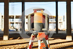 Laser levelling equipment at construction site photo