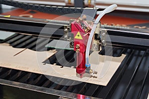 Laser machine for cutting and engraving plywood