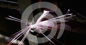 Laser machine cutting sheet metal at factory closeup