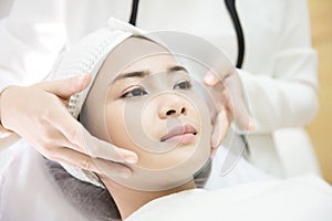 Laser Machine.Young woman receiving laser treatment.Skin Care.Young Woman Receiving Facial Beauty Treatment, Removing Pigmentation