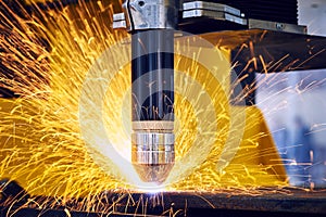 Laser or plasma cutting metalworking with sparks