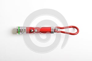 Laser pointer flashlight on white background