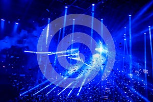 Laser show at generic party night club with bright spotlight on disco ball - Nightlife reopening concept about music and