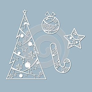 Lasercut Christmas tree ball candy toy star Christmas theme Set Design element of a lasercut lace Christmas toys for laser cutting photo