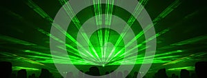 Lasershow festival disco  party background banner panorama - Colorful outdoor laser show with rays streams and crowd silhouette of