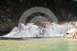 Lasir waterfall flowing in Lake Kenyir, Terengganu Malaysia