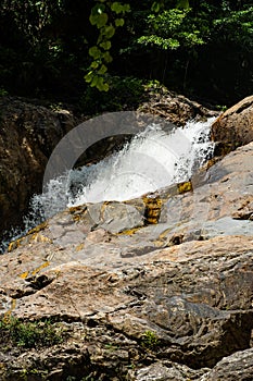 Lasir waterfall flowing in Lake Kenyir, Terengganu Malaysia