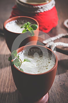 Lassie or lassi drink in terracotta glass