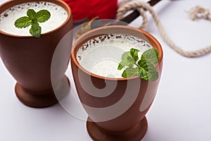 Lassie or lassi drink in terracotta glass