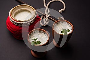 Lassie or lassi drink in terracotta glass