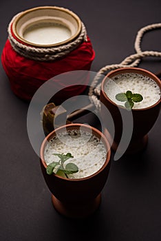 Lassie or lassi drink in terracotta glass