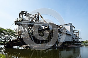The last abandoned tin mining dredger during British colonial now display in Tanjung Tualang, Batu Gajah, Perak, Malaysia