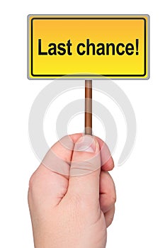 Last chance sign in hand.