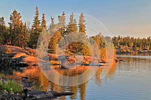 Last Evening Light on Trees and Canadian Shield at Frame Lake, Yellowknife, Northwest Territories photo