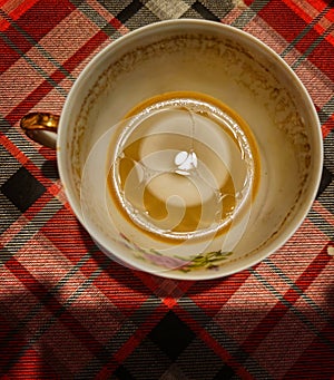 The last mouthful of coffe with milk and coconat oil photo