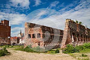 Last post war remains in Gdansk, Danzig, Poland. View through ruins to the old town. Granary Island