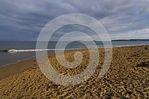 Last rays of summer sunshine light up Llanbedrog beach