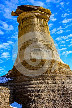 Last snow of the year clings to Hoodoos. Drumheller,Alberta,Canada