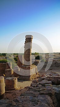 Last standing pillars of Napata`s temple of Amun at the foot of Jebel Barkal mountain , Karima, Sudan photo