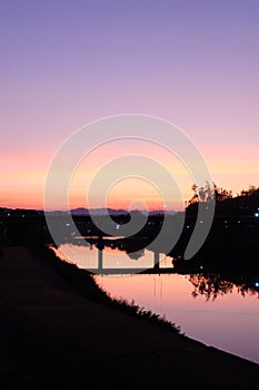 The Last Twilight of the Year over Nan River Bridge at Nan Province Thailand on 31 December 2022