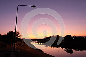 The Last Twilight of the Year over Nan River Bridge at Nan Province Thailand on 31 December 2022