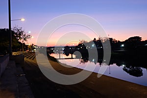 The Last Twilight of the Year over Nan River Bridge at Nan Province Thailand on 31 December 2022