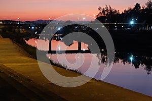 The Last Twilight of the Year over Nan River Bridge at Nan Province Thailand on 31 December 2022