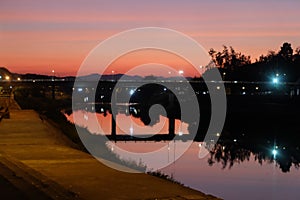 The Last Twilight of the Year over Nan River Bridge at Nan Province Thailand on 31 December 2022