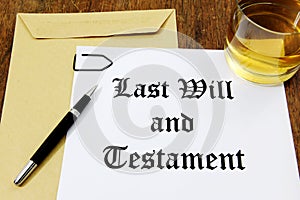 Last Will and Testament and glass of whiskey