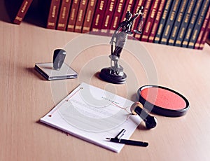 Last will waiting for a notary public sign on desk