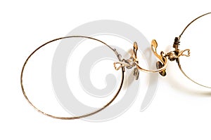 Late 19th century antique pince nez eyeglasses, isolated on whit