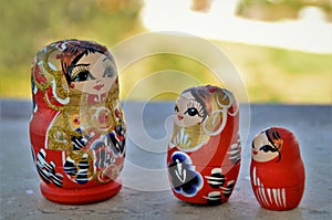 Late afternoon Russian dolls on the bench