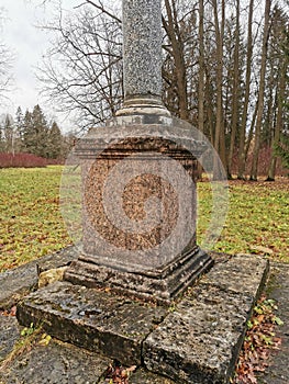 late autumn in Pavlovsky Park fallen foliation and cold wind stone vase