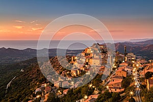 Late evening sunshine on mountain village of Speloncato in Corsica