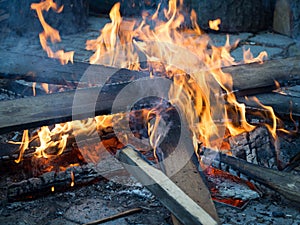 Late night at an almost burnt out campfire