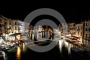 A late night long exposure view of the popular Grand Canal in Venice, taken from the top of the Ponte Rialto Bridge, with a light