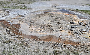 Late Spring in Yellowstone National Park: Big Anemone Geyser in the Geyser Hill Group in Upper Geyser Basin