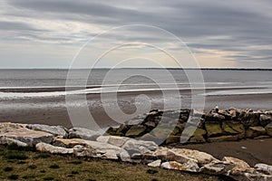 Late winter landscape of beach at North Point State Park Maryland photo