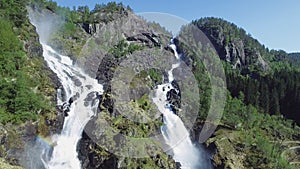 Latefossen - rapid waterfall in Norway. Aerial view, summer time.. Latefoss is a powerful, twin waterfall, famous