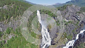 Latefossen - rapid waterfall in Norway. Aerial view, summer time.. Latefoss is a powerful, twin waterfall, famous