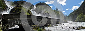 Latefossen waterfall with stone bridge in Norway