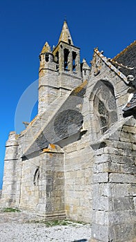 The lateral facade of the church - Finistere