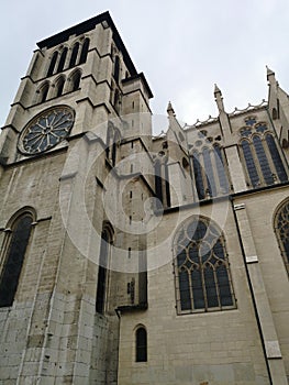 Lateral facade view of the Cathedral of St. John the Baptist of Lyon and the Basilic of Notre Dame at the background, France