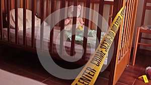 Lateral slide forensic investigations on kidnapping of children in a motel cradle with evidence in evidence marked with yellow