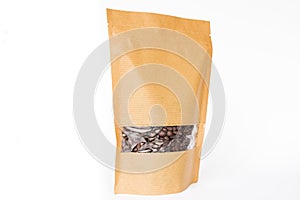 Lateral view of brown paper doypack stand up pouch with window zipper filled with coffee beans on white background