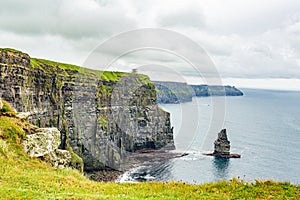 Lateral view of the Cliffs of Moher and the Branaunmore sea stack