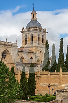 Lateral view at the iconic spanish Romanesque architecture building at the Cuidad Rodrigo cathedral, towers and domes photo