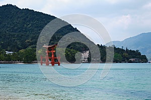 Itsukushima Jinja Otorii or Grand Torii Gate on the sea of Miyajima, Japan. photo