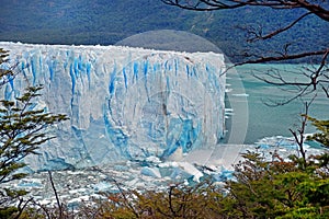 Lateral view of Perito Moreno Glacier, in El Calafate, Argentina, during a cloudy day.