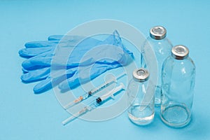 Latex gloves, syringes and bottles for liquid medicine